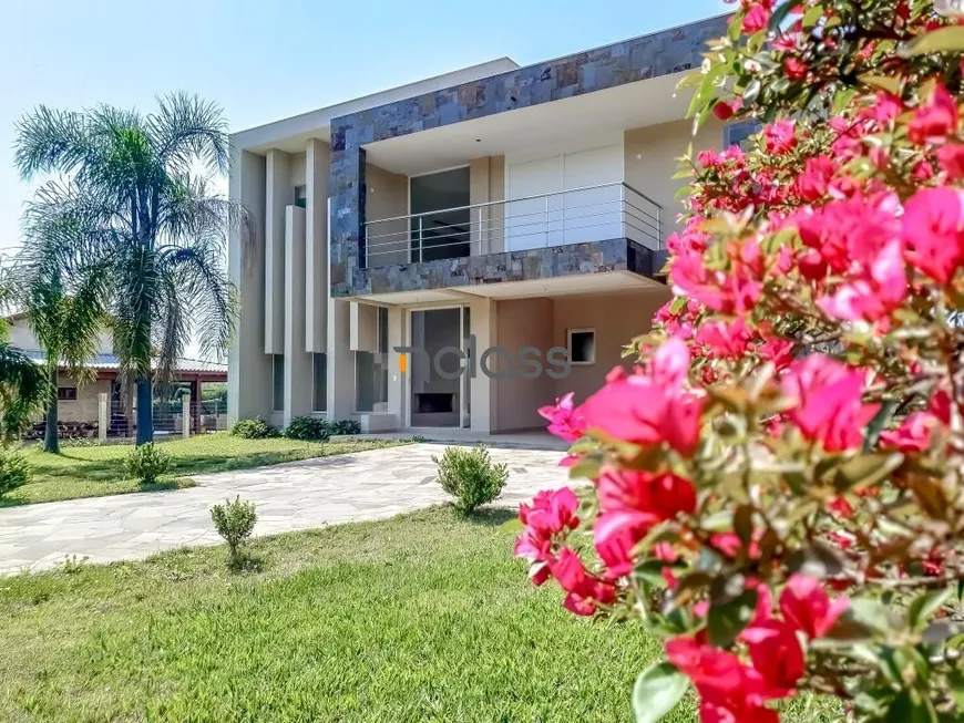 Foto 1 de Casa com 4 Quartos para venda ou aluguel, 310m² em Paragem dos Verdes Campos, Gravataí