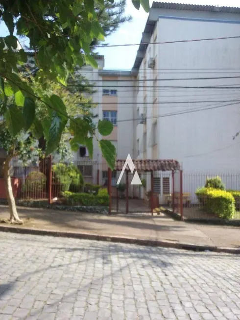 Foto 1 de Apartamento com 3 Quartos à venda, 60m² em Santo Antônio, Porto Alegre