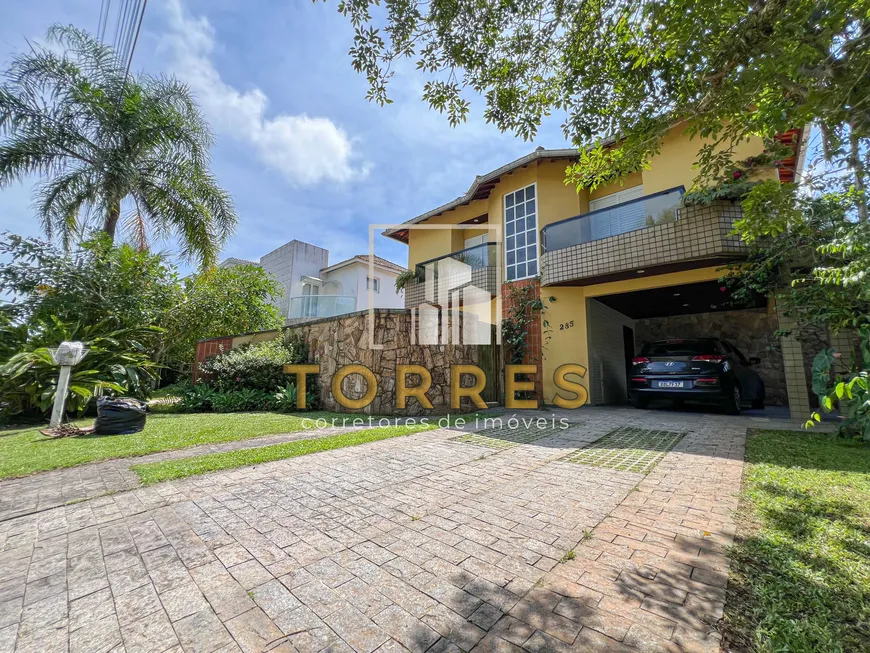 Foto 1 de Casa de Condomínio com 4 Quartos para alugar, 202m² em Balneário Praia do Pernambuco, Guarujá