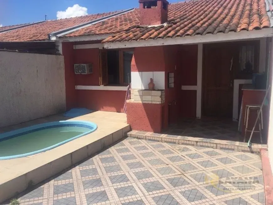 Foto 1 de Casa com 2 Quartos à venda, 51m² em Hípica, Porto Alegre