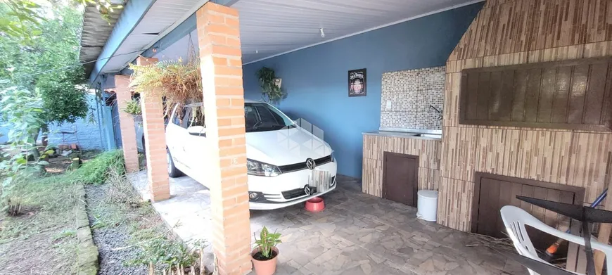 Foto 1 de Casa com 3 Quartos à venda, 90m² em Harmonia, Canoas