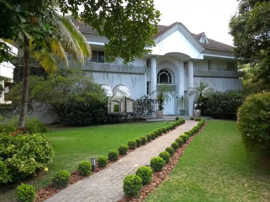 Foto 1 de Casa de Condomínio com 5 Quartos à venda, 1200m² em Barra da Tijuca, Rio de Janeiro