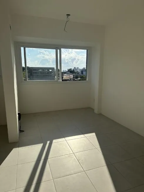 Foto 1 de Apartamento com 1 Quarto à venda, 36m² em Santo Antônio, Porto Alegre