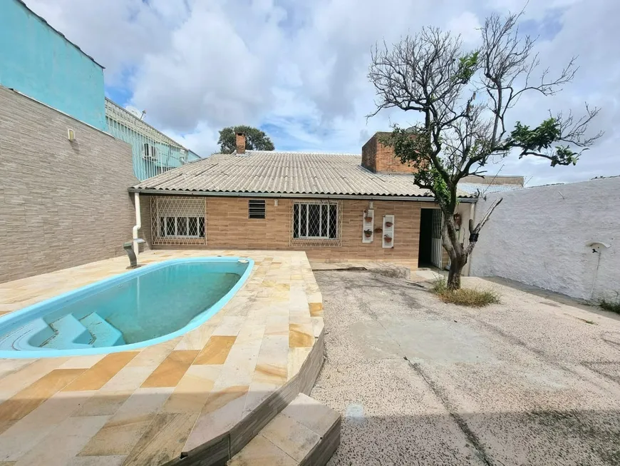 Foto 1 de Casa com 4 Quartos à venda, 154m² em Glória, Porto Alegre