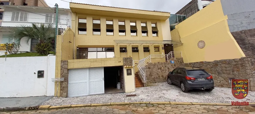 Foto 1 de Casa com 12 Quartos à venda, 407m² em Beira Mar, Florianópolis