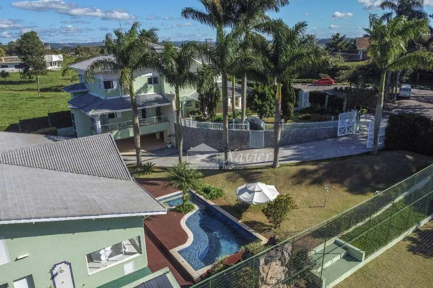 Foto 1 de Casa de Condomínio com 5 Quartos para venda ou aluguel, 850m² em Haras Bela Vista, Vargem Grande Paulista