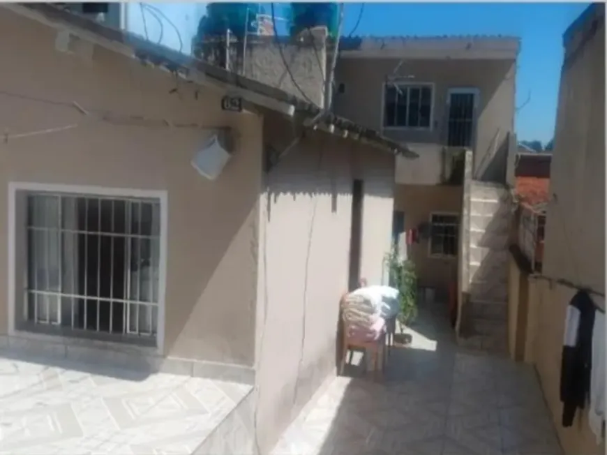 Foto 1 de Casa com 4 Quartos à venda, 200m² em Jardim São Salvador, Taboão da Serra