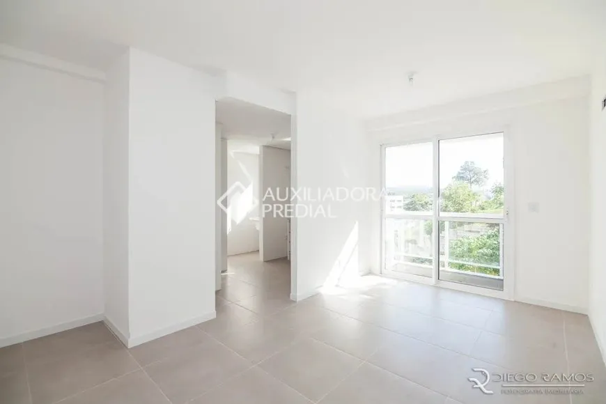 Foto 1 de Apartamento com 2 Quartos à venda, 60m² em Jardim Botânico, Porto Alegre