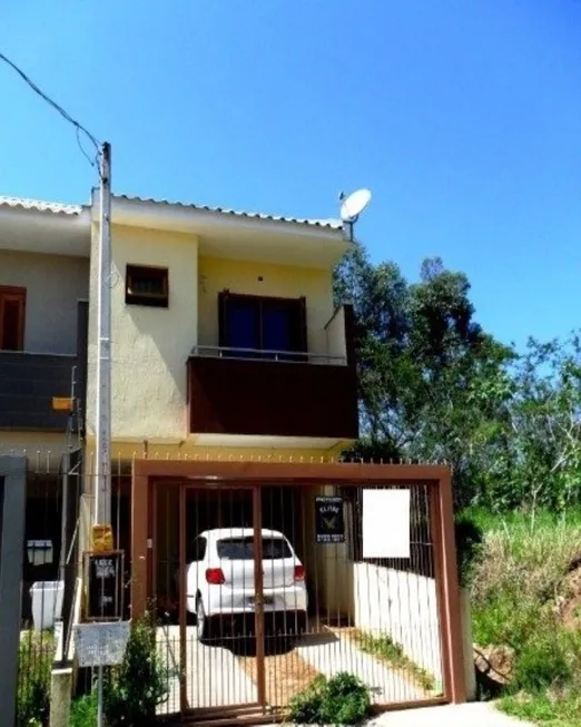 Foto 1 de Casa com 3 Quartos à venda, 148m² em Guarujá, Porto Alegre