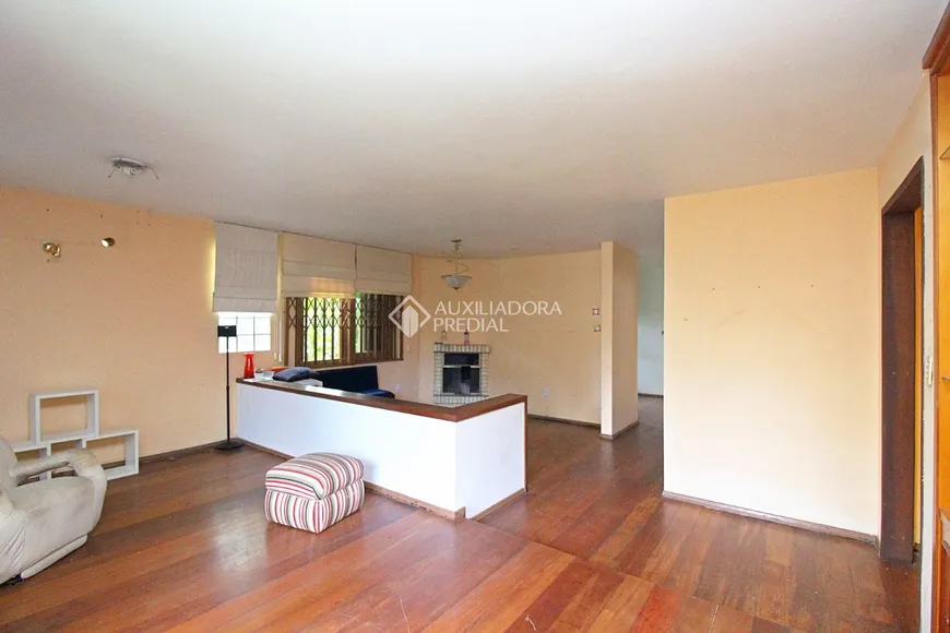 Foto 1 de Casa com 4 Quartos à venda, 210m² em Tristeza, Porto Alegre