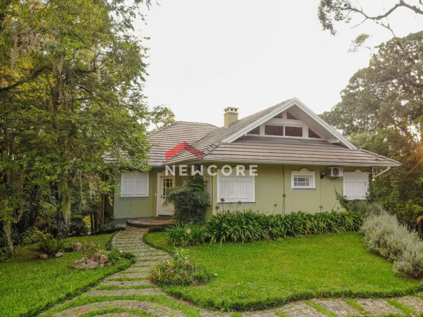 Foto 1 de Casa de Condomínio com 4 Quartos à venda, 420m² em Lagos do Bosque, Gramado