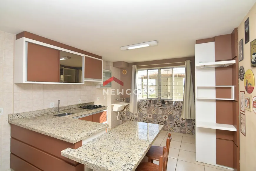 Foto 1 de Apartamento com 2 Quartos à venda, 48m² em Cabecudas, Laguna