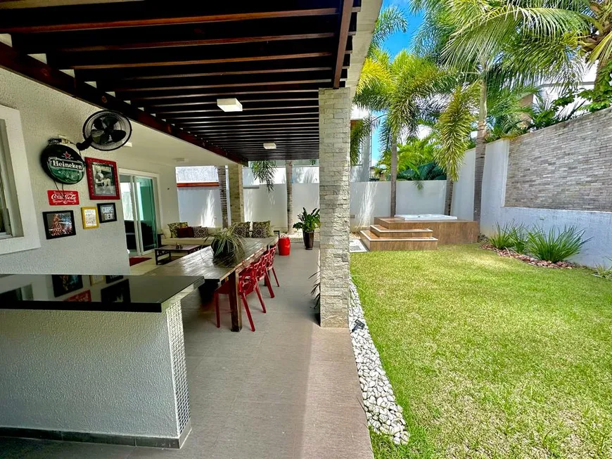 Foto 1 de Casa de Condomínio com 5 Quartos para venda ou aluguel, 392m² em Coacu, Eusébio