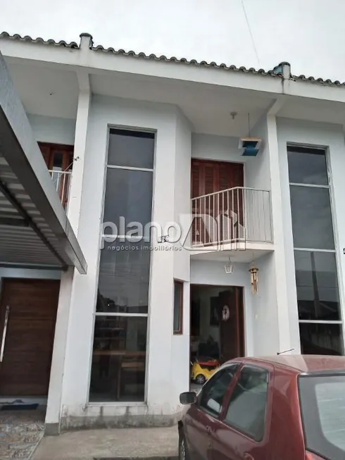 Foto 1 de Casa com 2 Quartos à venda, 67m² em Vila Morada Gaucha, Gravataí