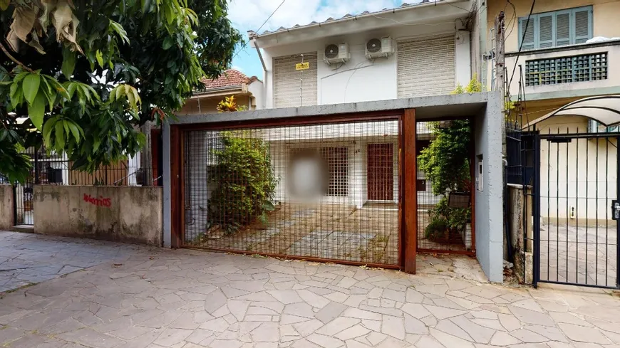 Foto 1 de Casa com 3 Quartos à venda, 196m² em Rio Branco, Porto Alegre