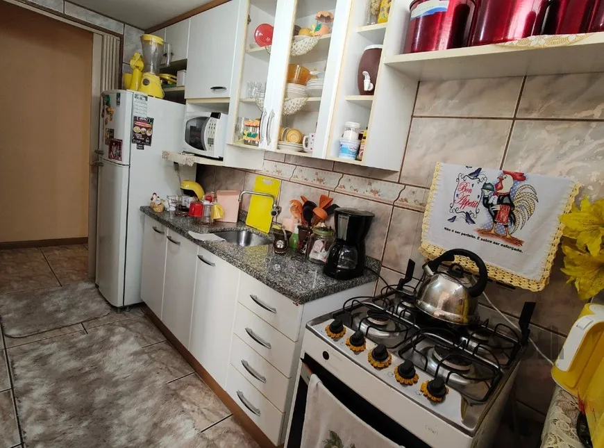 Foto 1 de Apartamento com 2 Quartos à venda, 58m² em Camaquã, Porto Alegre