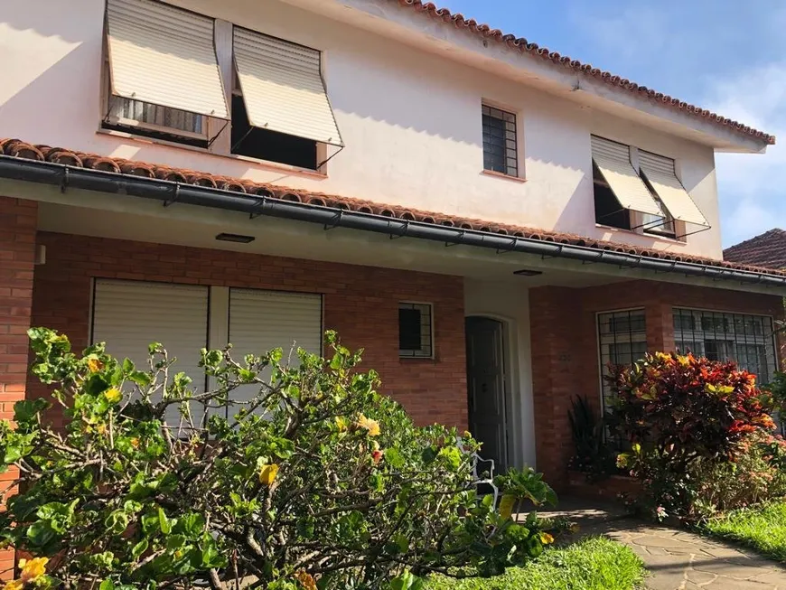 Foto 1 de Casa com 4 Quartos à venda, 256m² em Menino Deus, Porto Alegre