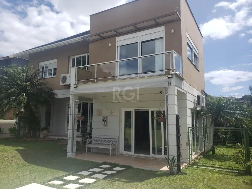 Foto 1 de Casa de Condomínio com 4 Quartos à venda, 225m² em Elsa, Viamão