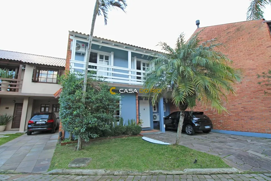 Foto 1 de Casa de Condomínio com 4 Quartos à venda, 216m² em Jardim Isabel, Porto Alegre