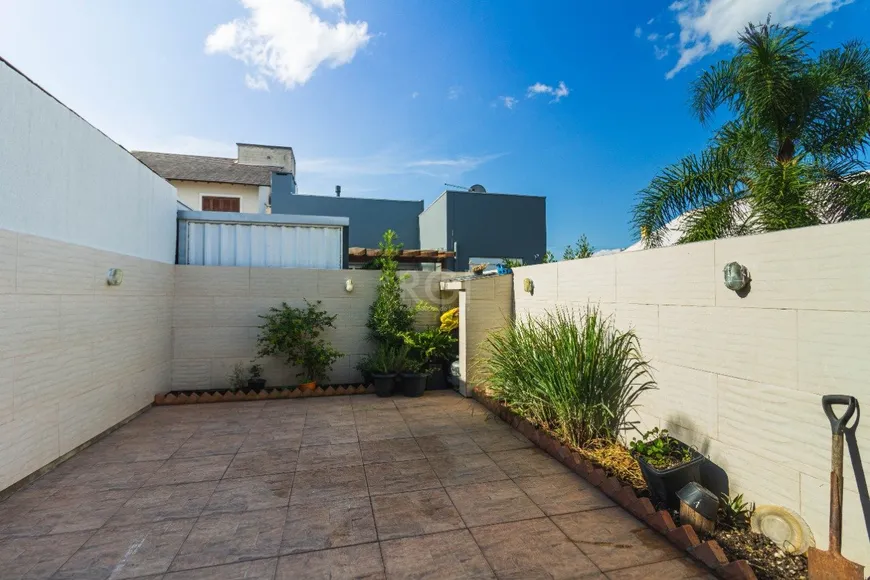 Foto 1 de Casa de Condomínio com 2 Quartos à venda, 139m² em Mário Quintana, Porto Alegre