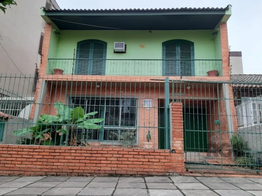 Foto 1 de Casa com 3 Quartos à venda, 130m² em Jardim Botânico, Porto Alegre