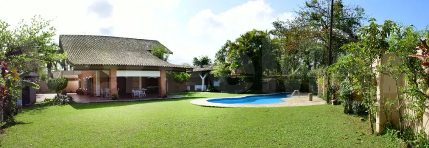 Foto 1 de Casa com 4 Quartos à venda, 460m² em Enseada, Guarujá