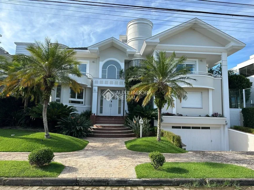 Foto 1 de Casa com 5 Quartos para alugar, 320m² em Jurerê Internacional, Florianópolis