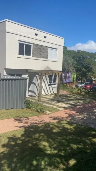 Foto 1 de Sobrado com 2 Quartos à venda, 86m² em Vila Nova, Porto Alegre