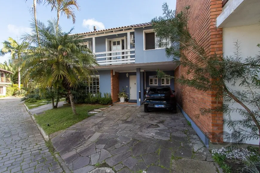 Foto 1 de Casa de Condomínio com 3 Quartos à venda, 215m² em Jardim Isabel, Porto Alegre