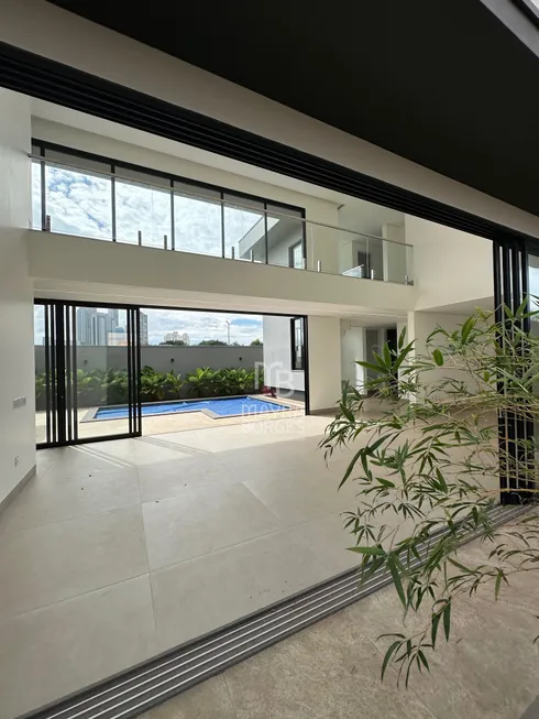Foto 1 de Casa de Condomínio com 4 Quartos à venda, 408m² em Gávea, Uberlândia