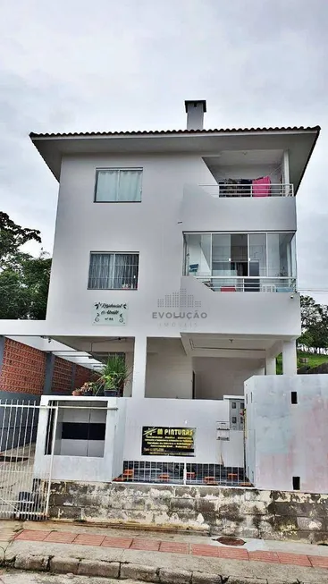 Foto 1 de Apartamento com 2 Quartos à venda, 56m² em Forquilhas, São José