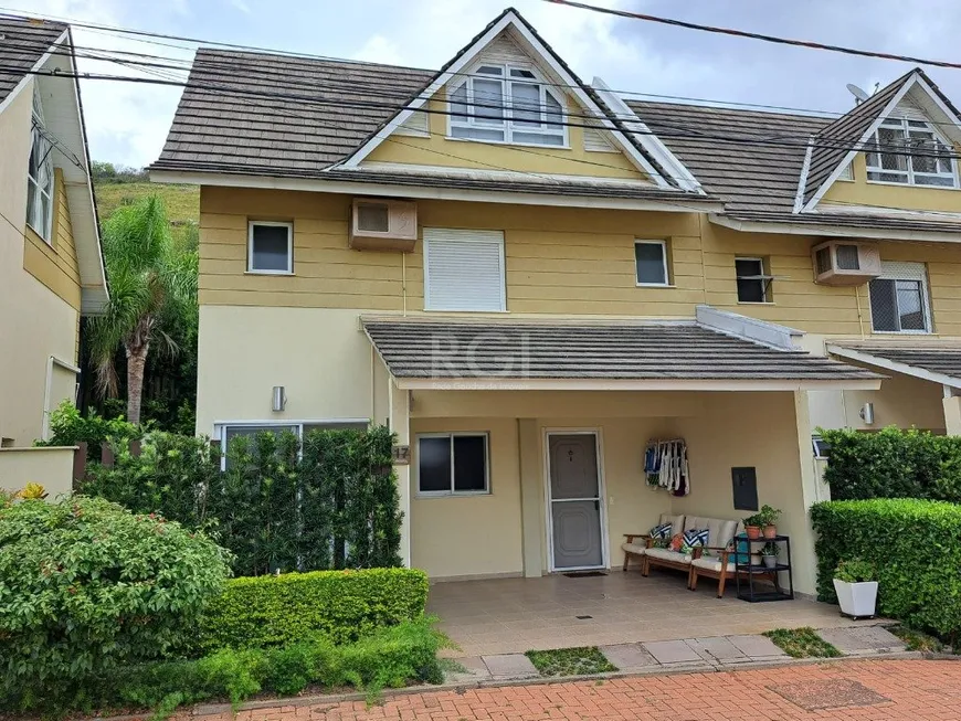 Foto 1 de Casa de Condomínio com 3 Quartos à venda, 223m² em Teresópolis, Porto Alegre