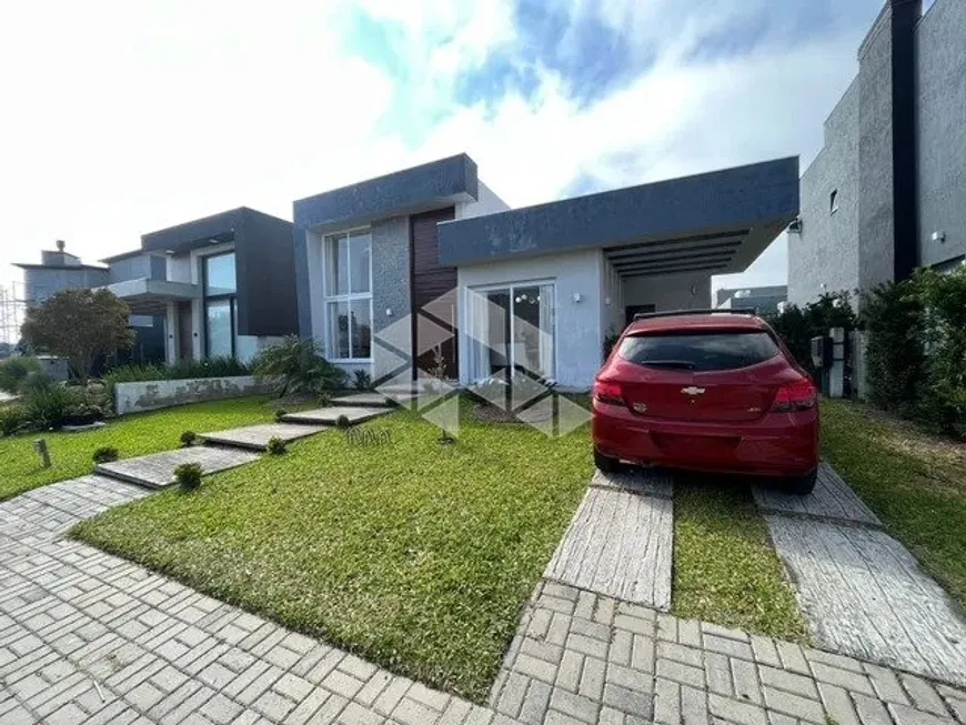 Foto 1 de Casa de Condomínio com 3 Quartos à venda, 135m² em Capao da Canoa, Capão da Canoa