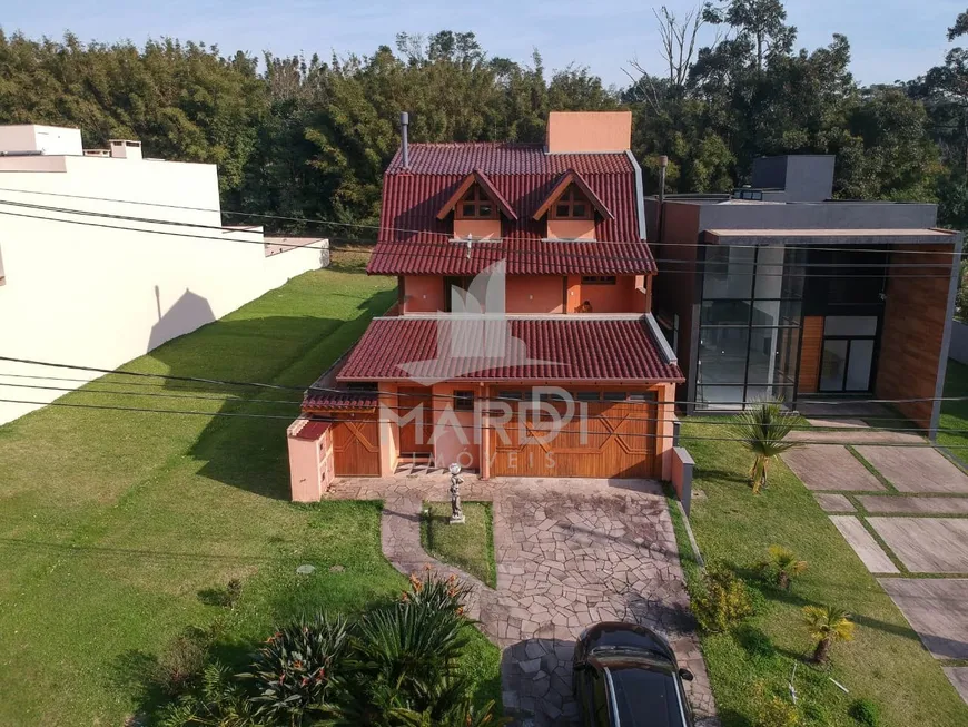 Foto 1 de Casa de Condomínio com 3 Quartos à venda, 332m² em Belém Novo, Porto Alegre