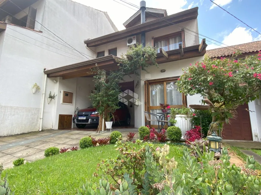 Foto 1 de Casa de Condomínio com 3 Quartos à venda, 106m² em Cavalhada, Porto Alegre