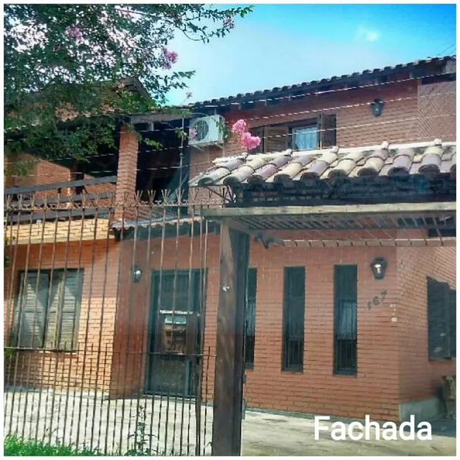 Foto 1 de Casa com 3 Quartos à venda, 205m² em Vila Nova, Porto Alegre