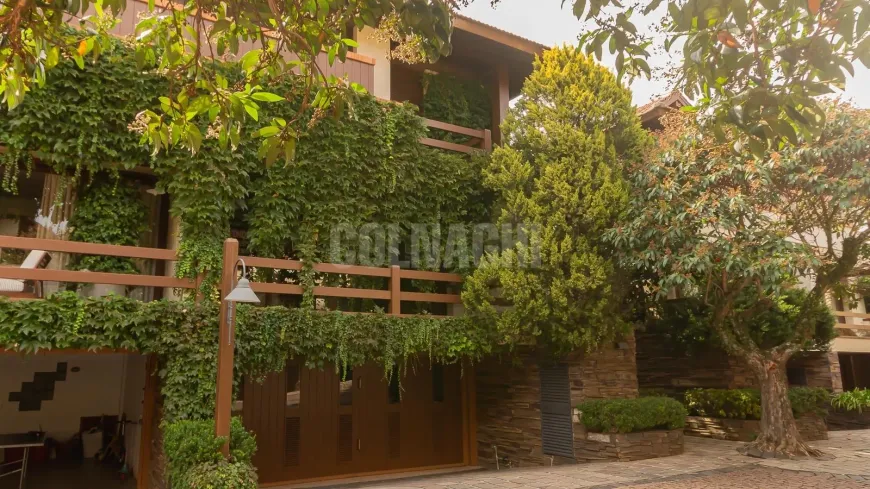 Foto 1 de Casa de Condomínio com 4 Quartos à venda, 424m² em Boa Vista, Porto Alegre