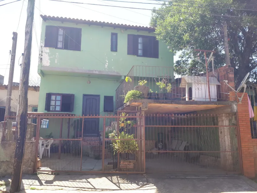 Foto 1 de Casa com 4 Quartos à venda, 89m² em Tarumã, Viamão