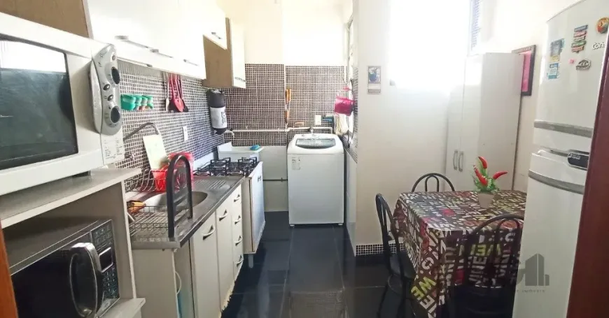 Foto 1 de Apartamento com 2 Quartos à venda, 49m² em Santo Antônio, Porto Alegre