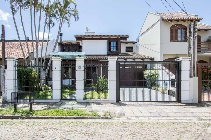 Foto 1 de Casa com 4 Quartos à venda, 239m² em Ipanema, Porto Alegre