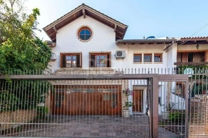 Foto 1 de Casa com 4 Quartos à venda, 285m² em Jardim Botânico, Porto Alegre