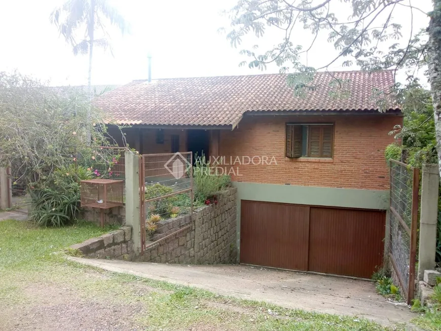 Foto 1 de Casa com 2 Quartos à venda, 120m² em Vila Nova, Porto Alegre