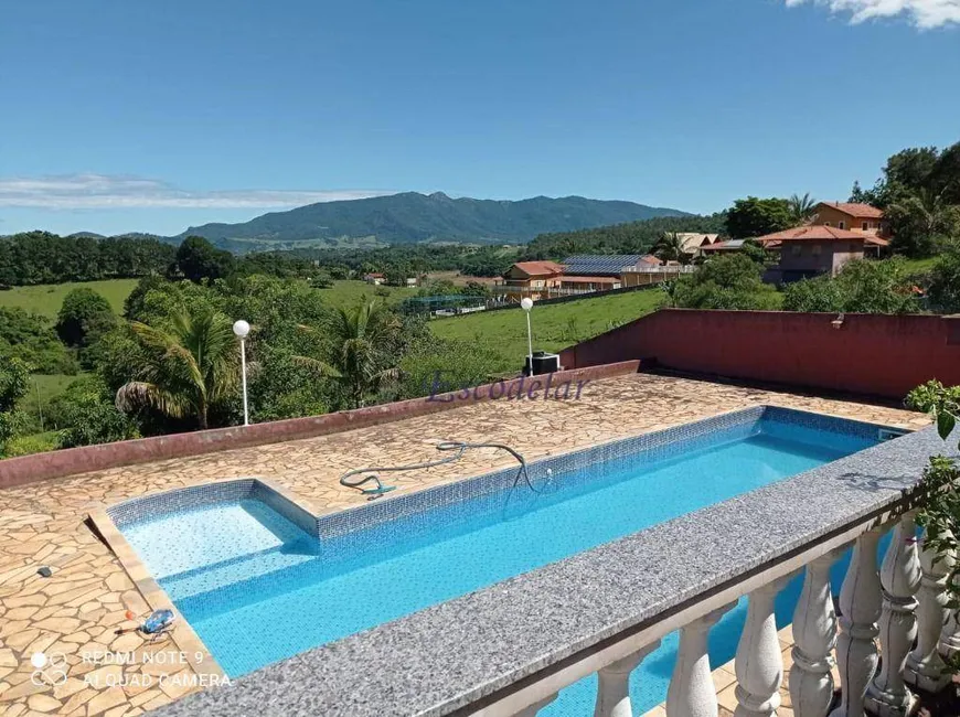 Foto 1 de Fazenda/Sítio com 4 Quartos à venda, 250m² em Zona Rural, Piracaia