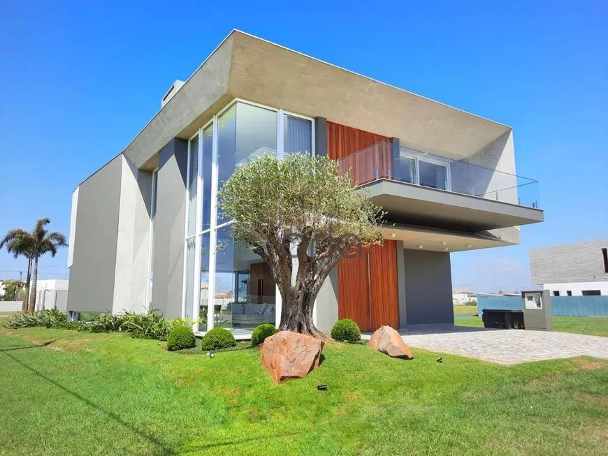 Foto 1 de Casa de Condomínio com 5 Quartos à venda, 470m² em Xangri la, Xangri-lá