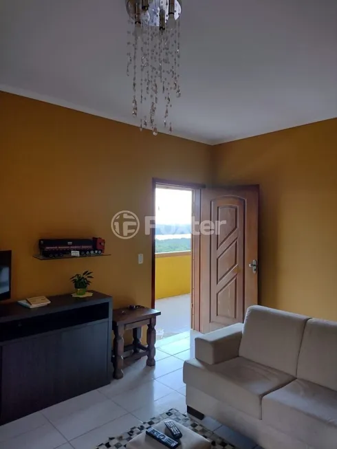 Foto 1 de Casa com 2 Quartos à venda, 239m² em Lomba do Pinheiro, Porto Alegre