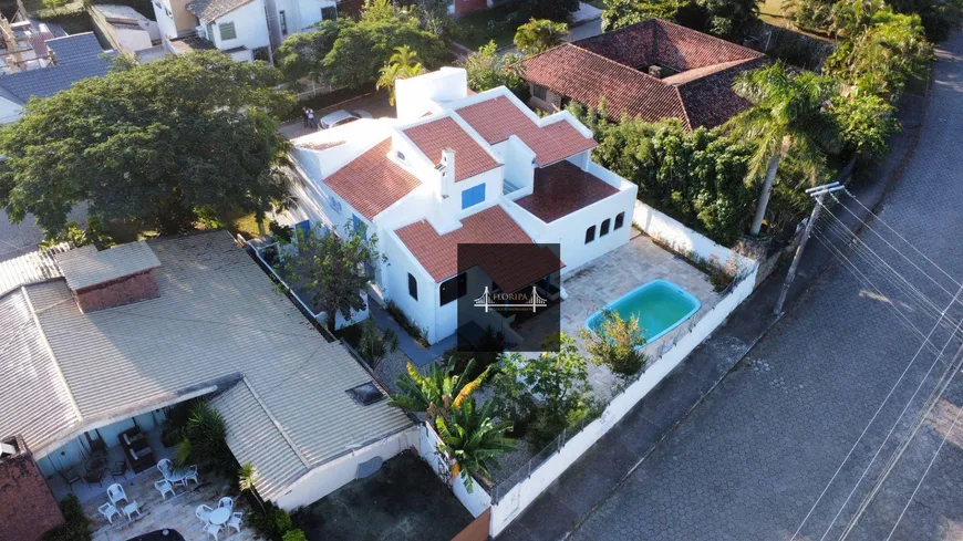 Foto 1 de Casa de Condomínio com 5 Quartos à venda, 346m² em Lagoa da Conceição, Florianópolis