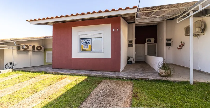 Foto 1 de Casa de Condomínio com 3 Quartos à venda, 58m² em Jardim Algarve, Alvorada