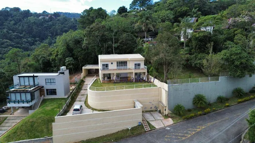 Foto 1 de Casa de Condomínio com 4 Quartos à venda, 330m² em Cantareira, Mairiporã