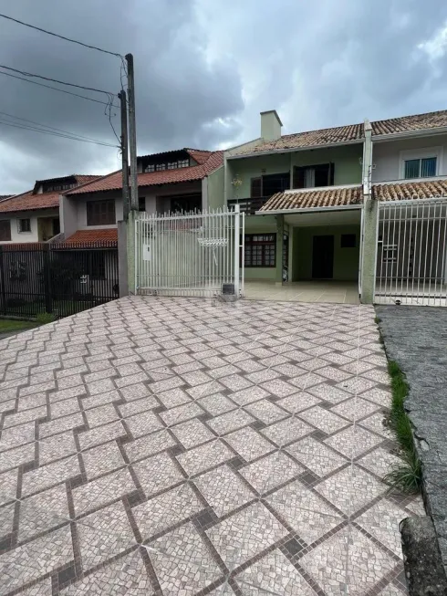 Foto 1 de Sobrado com 4 Quartos à venda, 189m² em Boa Vista, Curitiba