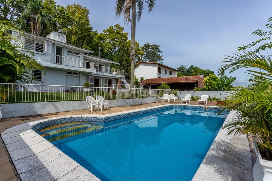 Foto 1 de Casa com 5 Quartos à venda, 320m² em Vila Conceição, Porto Alegre